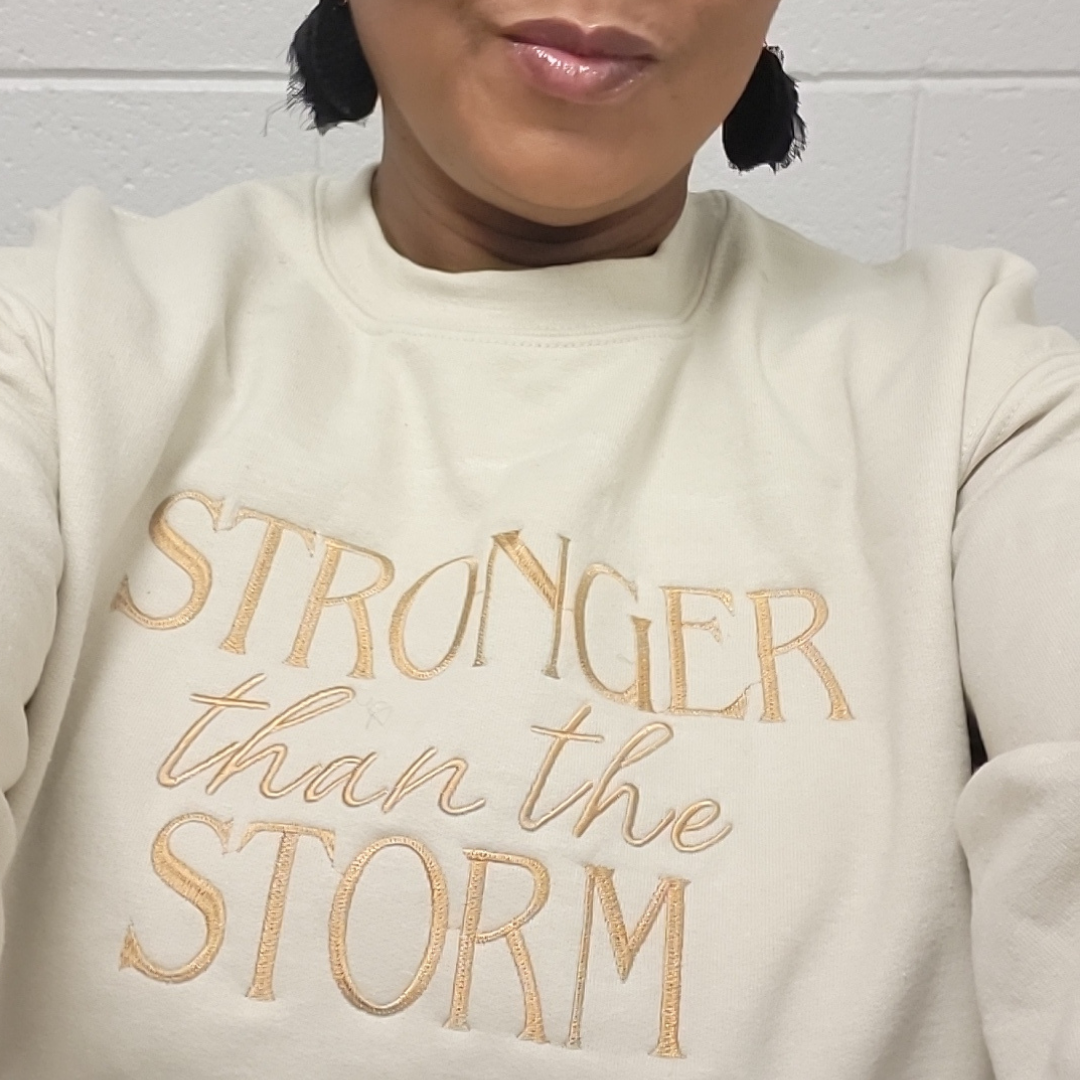 Stronger Than The Storm Embroidered Sweatshirt